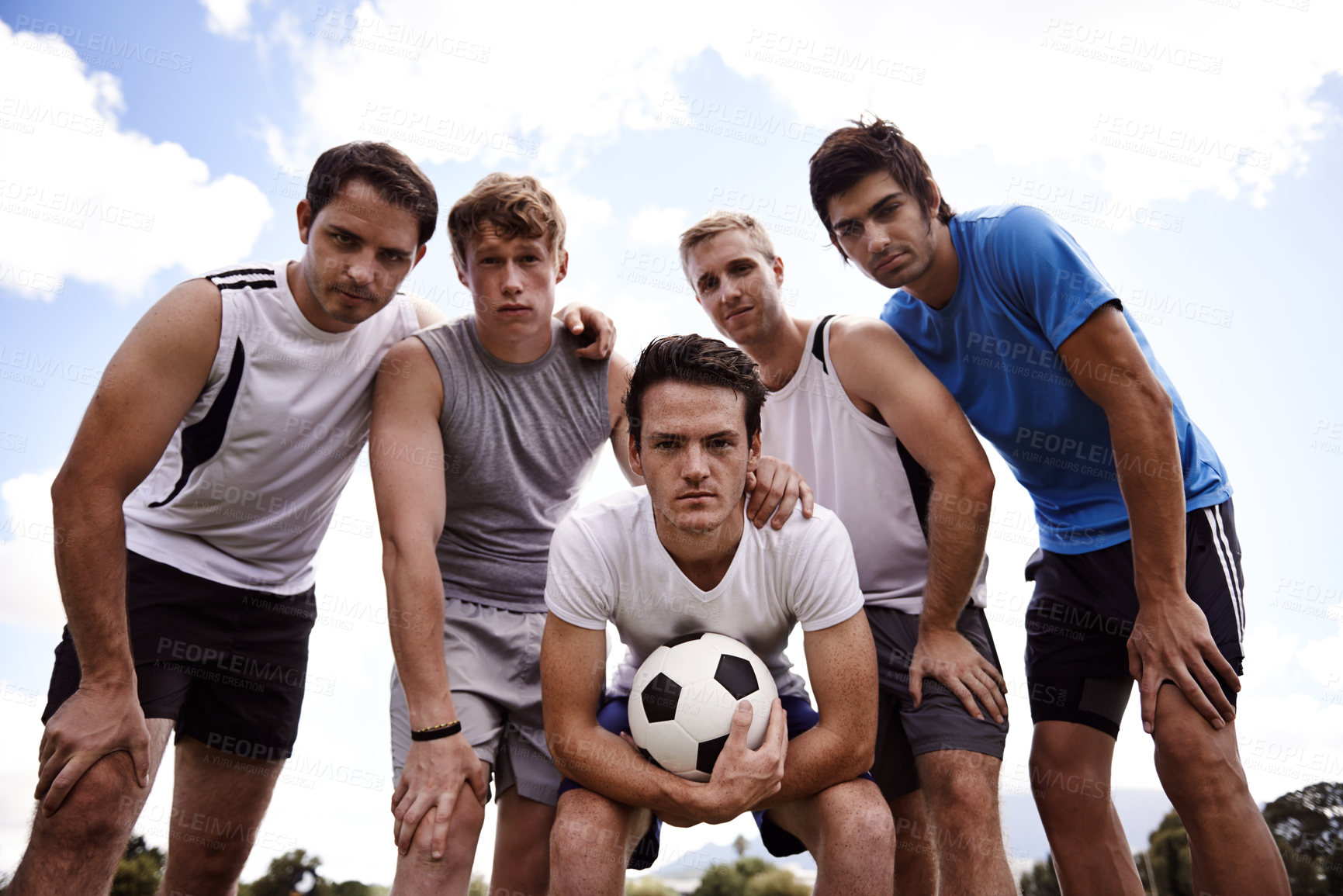 Buy stock photo Portrait of a group of determined young soccer players