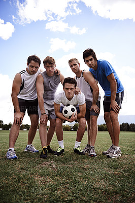 Buy stock photo Soccer player, team and portrait in low angle, field and together with hug for training, exercise and workout. People, sports and football with scrum, embrace and solidarity for game in competition