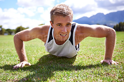 Buy stock photo Man, push up and bicep in portrait on grass, strong core and muscle development in training. Male person, fitness and endurance on field, exercise and athlete for workout or bodybuilder challenge