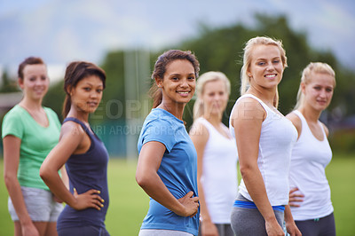 Buy stock photo Team, women and friends with sports on field for health, fitness and training with diversity in summer. People, exercise and games in group on grass for workout, wellness or together in Los Angeles