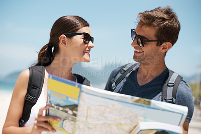 Buy stock photo Couple, map and search on travel by ocean, mountains or smile to check direction for help on vacation. Woman, man and chart at location, landmark or reading with thinking on holiday at beach in Italy