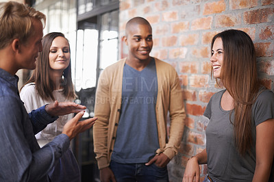 Buy stock photo Laughing, friends or students talking in a college hallway for discussion, funny chat and project. Group of diversity men and women at campus or university for a conversation about education career
