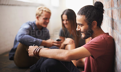 Buy stock photo Technology, typing and students in a hallway, university and connection with social media and lunch break. Group, outdoor and friends in a lobby and smartphone and mobile user with meme and contact