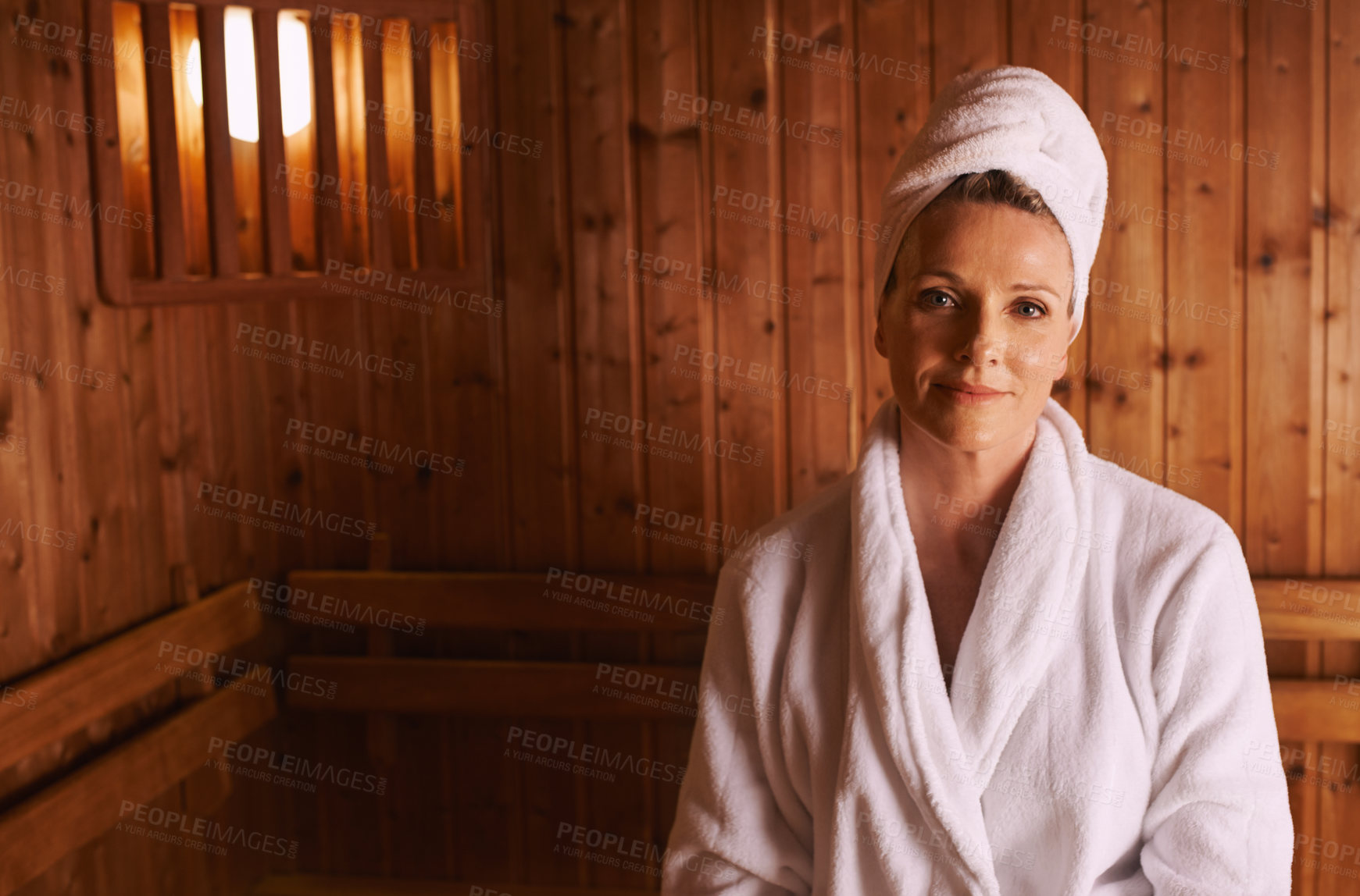 Buy stock photo Woman, portrait and spa sauna in bathrobe for accommodation hospitality, treatment or stress relief. Female person, face and towel at Bali resort for holiday vacation with wellness, care or relax