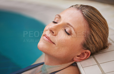 Buy stock photo Swimming pool, rest and woman relax on holiday, summer vacation and weekend getaway. Travel, luxury spa resort and calm female person relaxing in water for happiness, wellness and peace outdoors