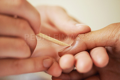 Buy stock photo Cropped shot of a woman getting a manicure
