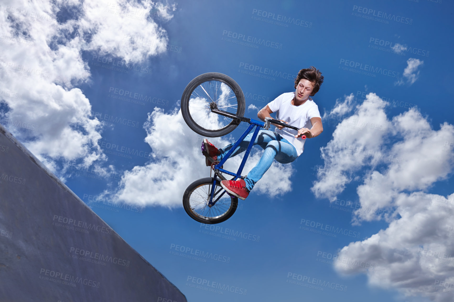 Buy stock photo Ramp, jump and man with bike in sky at park, event or competition for sport with risk and energy. Mockup, space and person in air with trick or stunt on bicycle for fun in summer with adventure