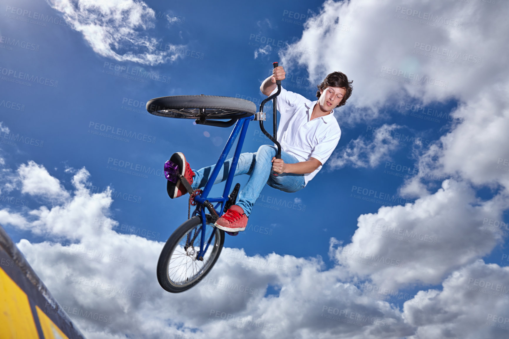 Buy stock photo Trick, jump and man with bike in sky at park, event or competition for sport with risk, energy or freedom. Mockup, space or person in air with fearless stunt on bicycle for fun adventure in summer