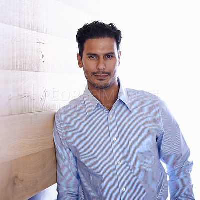 Buy stock photo Businessman, portrait and confident professional by wood background and confidence in career in workplace. Designer, indian and face with pride in creative job, ambition and fashion shirt in office