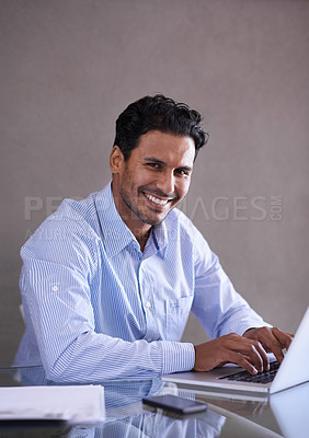 Buy stock photo Businessman, laptop or happy portrait by desk for social media or online research in office. Entrepreneur, computer or technology for small business website, productivity or typing in startup company