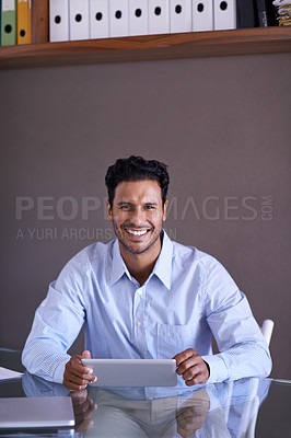 Buy stock photo Businessman, tablet and portrait by desk on social media and connection for online research in office. Entrepreneur, smile face and technology for small business website and scroll in startup company