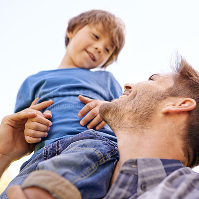 Buy stock photo Family, smile and son on shoulder of father closeup outdoor for love, bonding or fun together. Face, happy or relax with man parent and boy child on sky from below for summer vacation or holiday