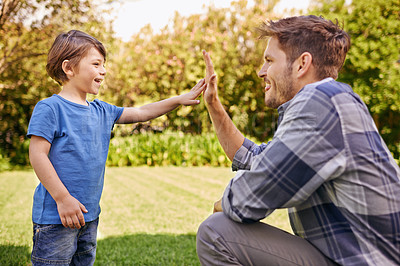 Buy stock photo High five, child and dad in park for family adventure, success or motivation with development. Man, boy kid and happy with excited hand gesture for support, teamwork or happiness together in nature