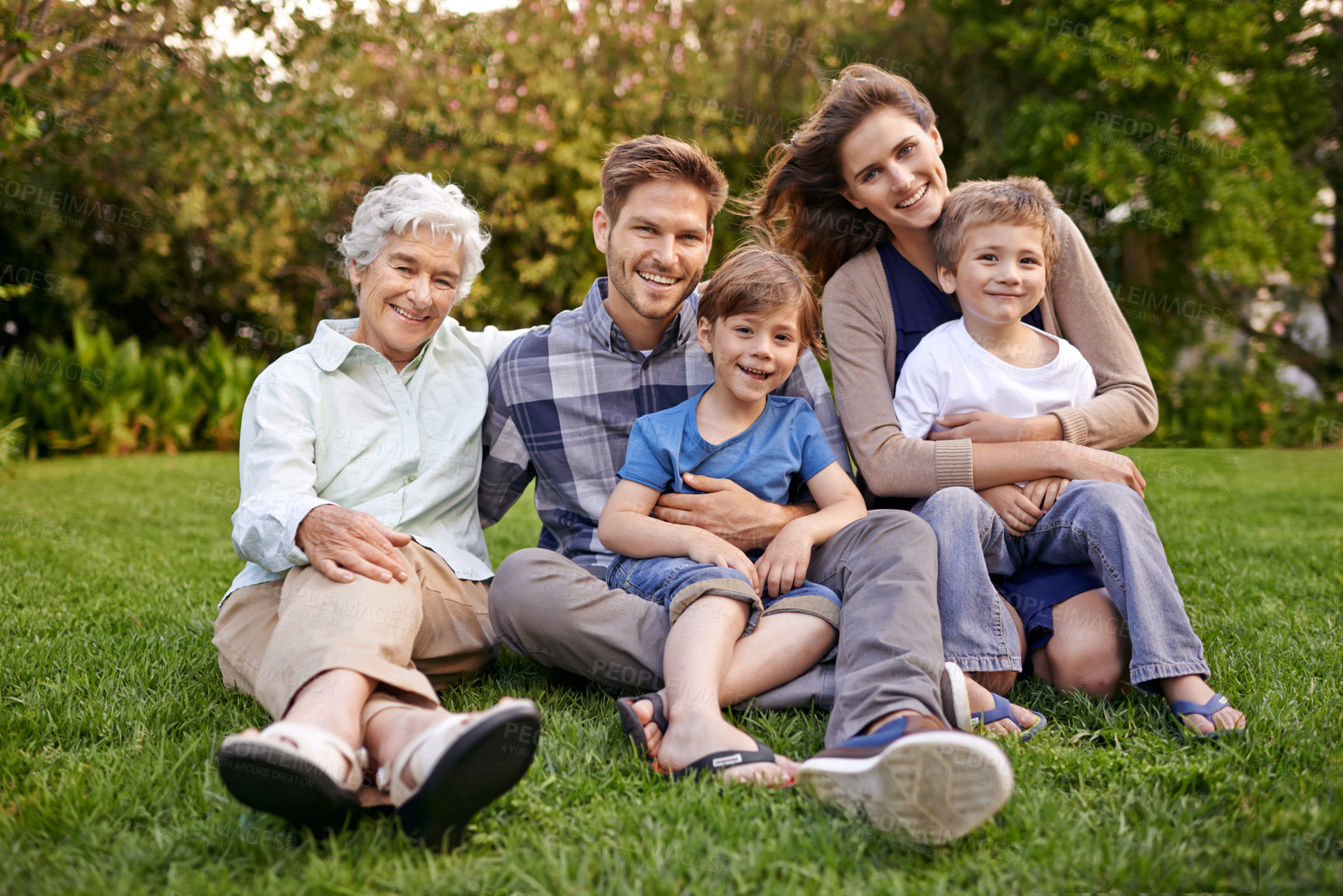 Buy stock photo Nature, portrait and children with parents and grandmother relaxing on grass in outdoor park or garden. Smile, family and boy kids on lawn with mom, dad and grandma for bonding in field together.