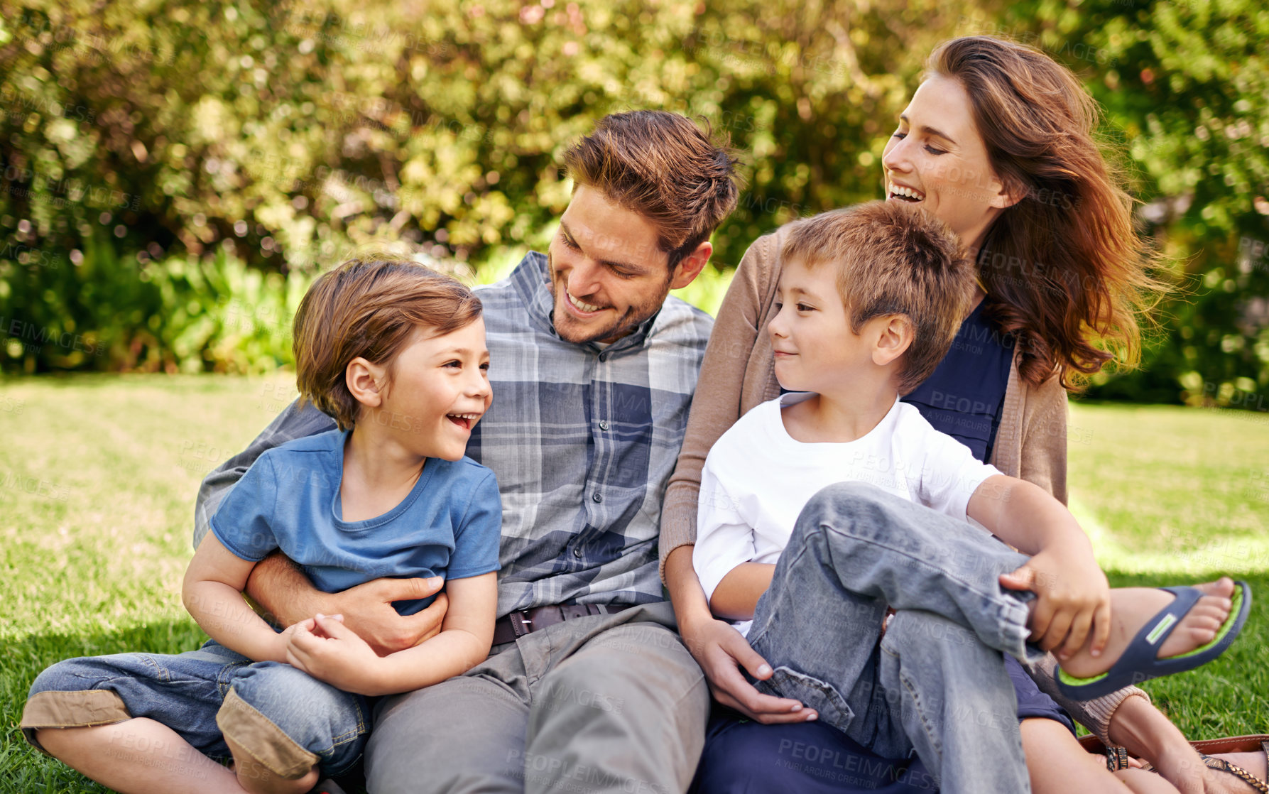 Buy stock photo Cropped shot of a loving family spending time outdoors