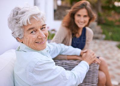 Buy stock photo Cropped shot of a young woman and her senior mother
