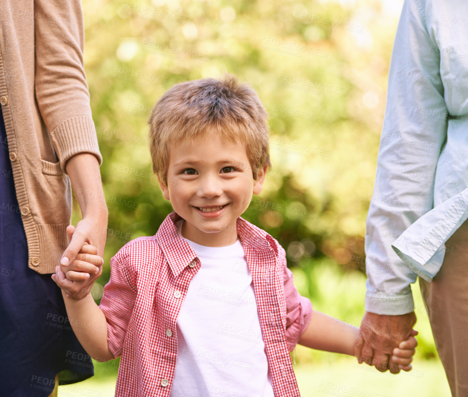 Buy stock photo Portrait, holding hands and child with family in backyard garden for fun, bonding and relax together. Smile, face and young kid on holiday vacation, adventure or morning walk in outdoor nature.