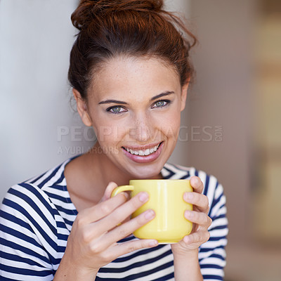 Buy stock photo Portrait of an attractive young woman enjoying a cup of coffee