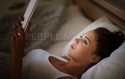 Buy stock photo Woman, tablet and bed at night, scrolling and entertainment with tech and relaxing for peace before sleep. Female person, browsing and online for home, internet and elearning or social media