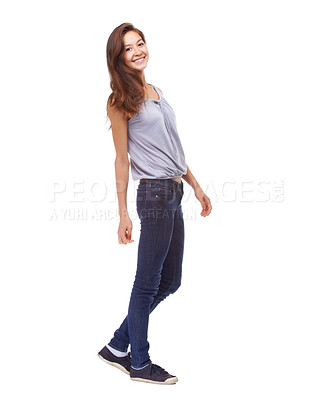 Buy stock photo Portrait, fashion and smile with casual woman in studio isolated on white background for satisfaction. Model, clothes or confident and happy young woman in trendy clothing outfit with denim jeans