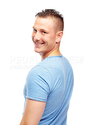 Buy stock photo Man, portrait and confidence for fashion, clothing and trendy style in casual looks on studio background with happiness, contemporary outfit and smile. Male person, model and face in blue t shirt
