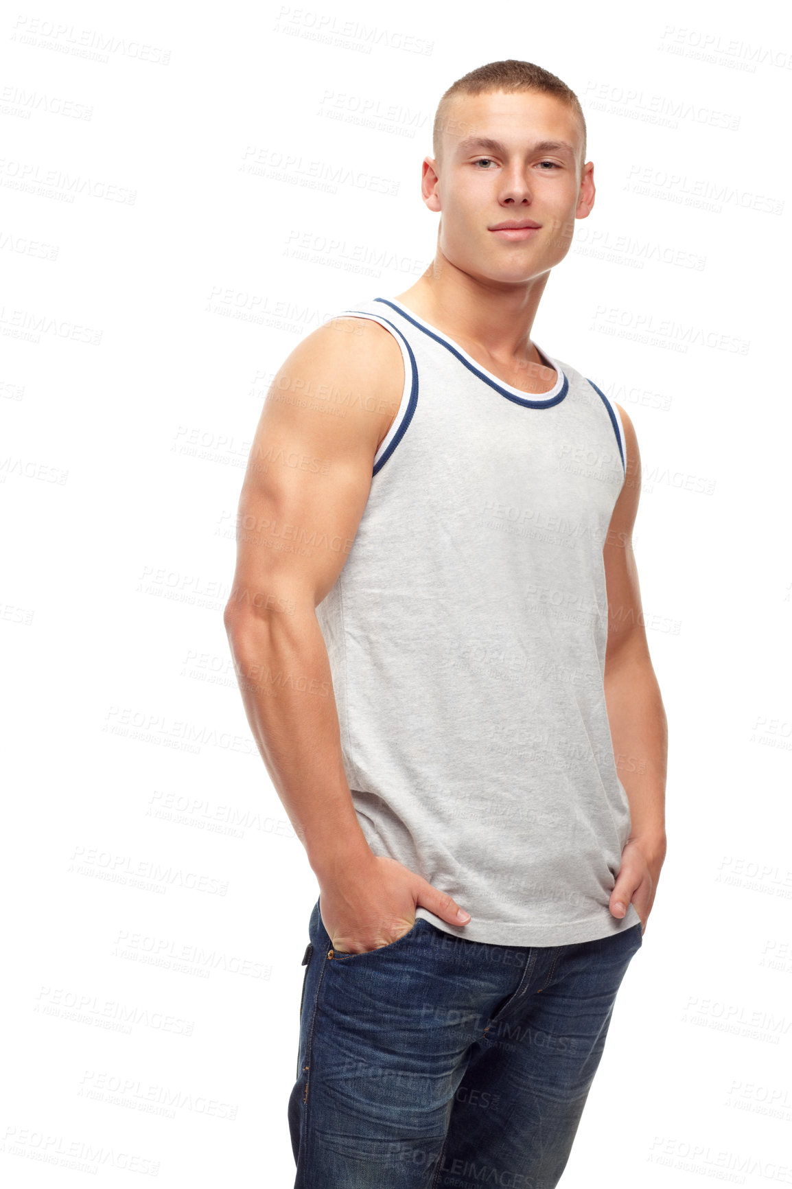 Buy stock photo Man, confident smile and portrait with fashion and modern style in studio. White background, jeans and young male model with muscles and clothing with youth and attitude feeling cool with confidence