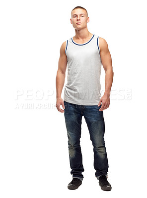 Buy stock photo Man, confident and portrait with fashion and modern style in a studio. White background, jeans and young male model with muscles and clothing with youth and attitude feeling proud with confidence