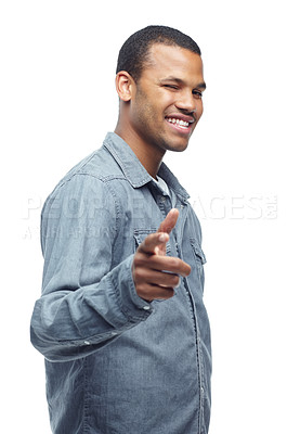 Buy stock photo Portrait, African man and pointing gesture isolated on studio background with wink, confidence and smile. Male person, model and face for fashion, clothing and happiness for style, trend and chic