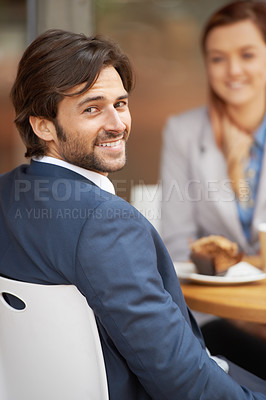 Buy stock photo Portrait, smile and businessman meeting at coffee shop with colleague for collaboration or planning in morning. Face, happy for breakfast and corporate employee at outdoor cafe with coworker