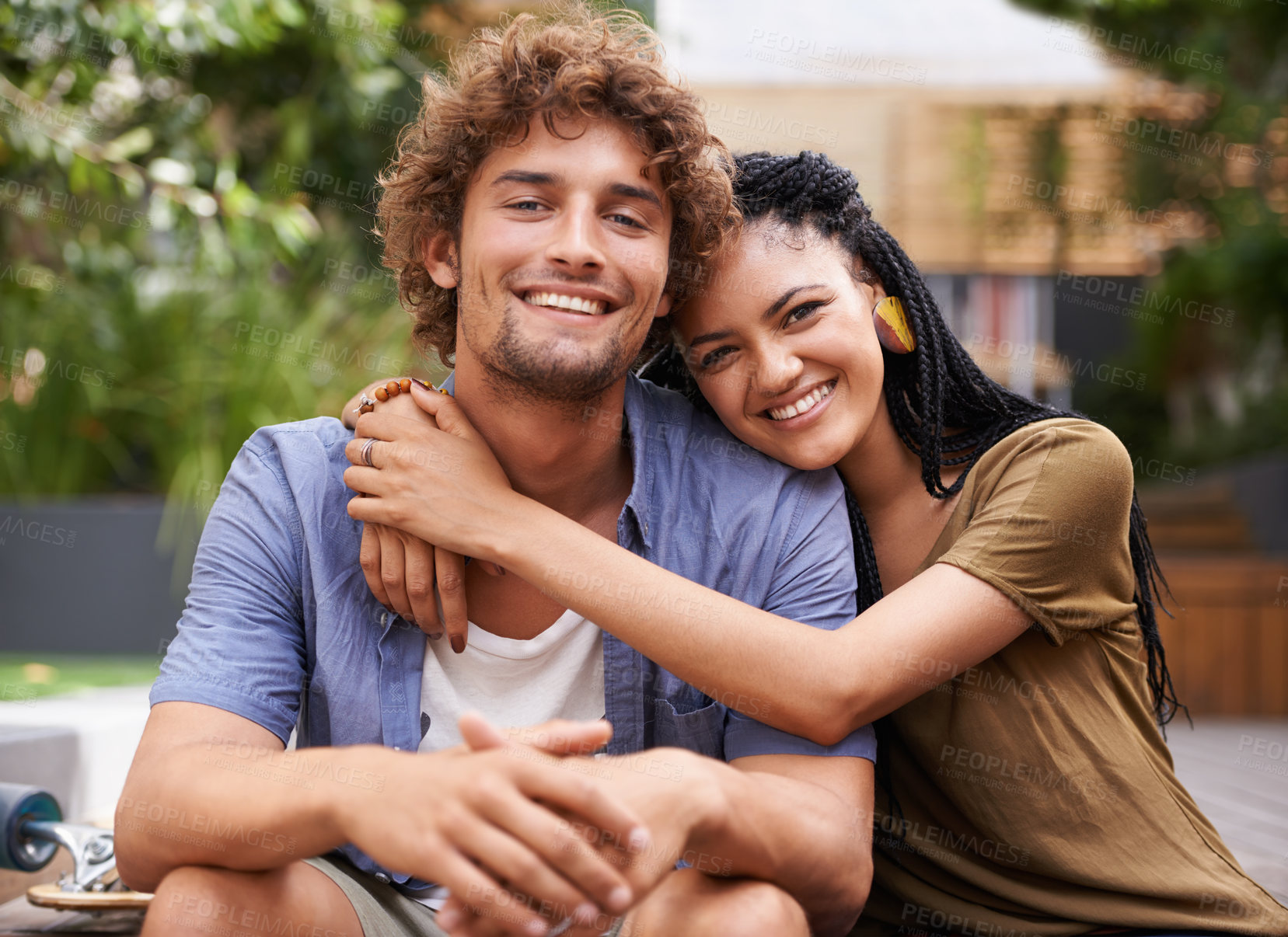 Buy stock photo Portrait, couple and interracial with smile, love and hug outdoors in garden, backyard and patio in Jamaica. Male person, girlfriend and diversity lovers with partnership, affection and bonding