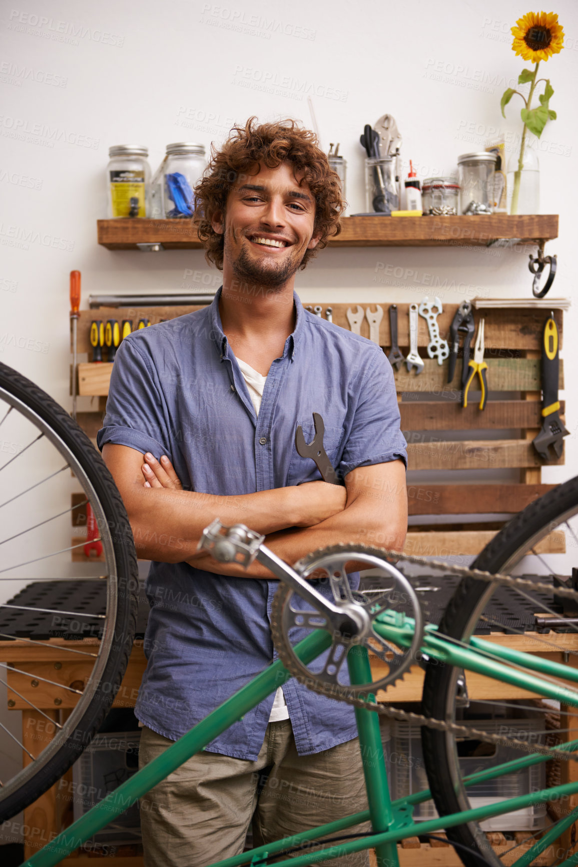 Buy stock photo Mechanic, bicycle and smile with tools at workshop for repair, maintenance with small business. Entrepreneur, handyman and garage as expert for diy to fix bike with equipment for service and upgrade