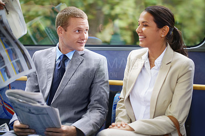 Buy stock photo Shot of young business people commuting to work