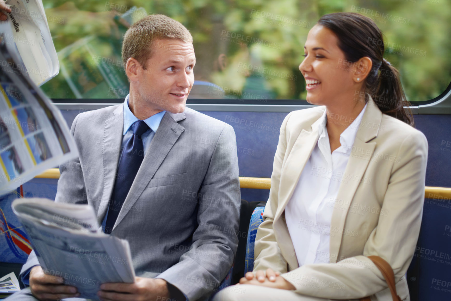 Buy stock photo Shot of young business people commuting to work