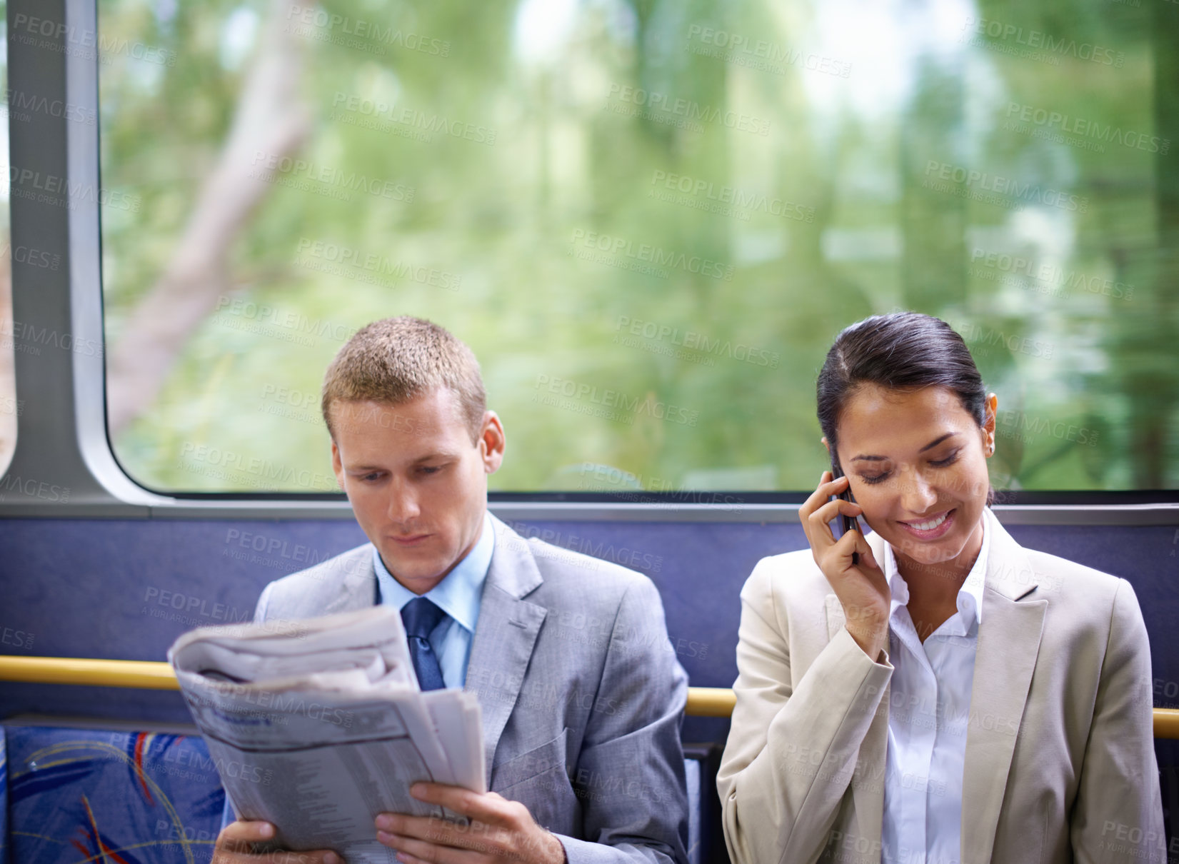 Buy stock photo Bus, business people and commute for communication or news, reading newspaper and phone call for info. Woman, networking and app for conversation or travel, newsletter and man for article on transit