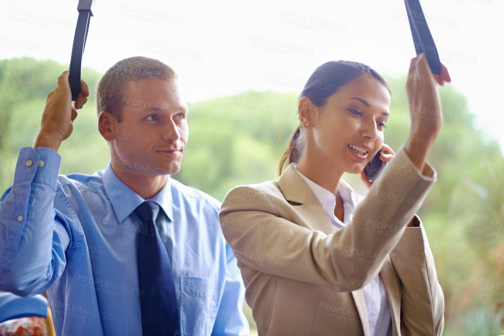 Buy stock photo People, phone call and woman on bus for commute, travel and public transport in urban city. Business man, female person or coworkers together in transit to workplace with smartphone for communication