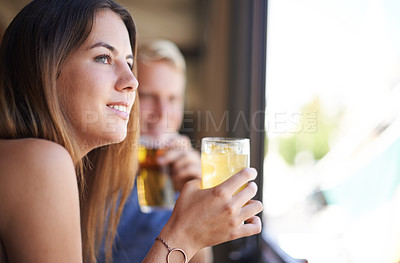 Buy stock photo Smile, woman and drinking alcohol at pub, thinking and relax at restaurant for celebration at club. Bar, glass and dream of happy person with a cocktail or beverage at cafe for party with friends