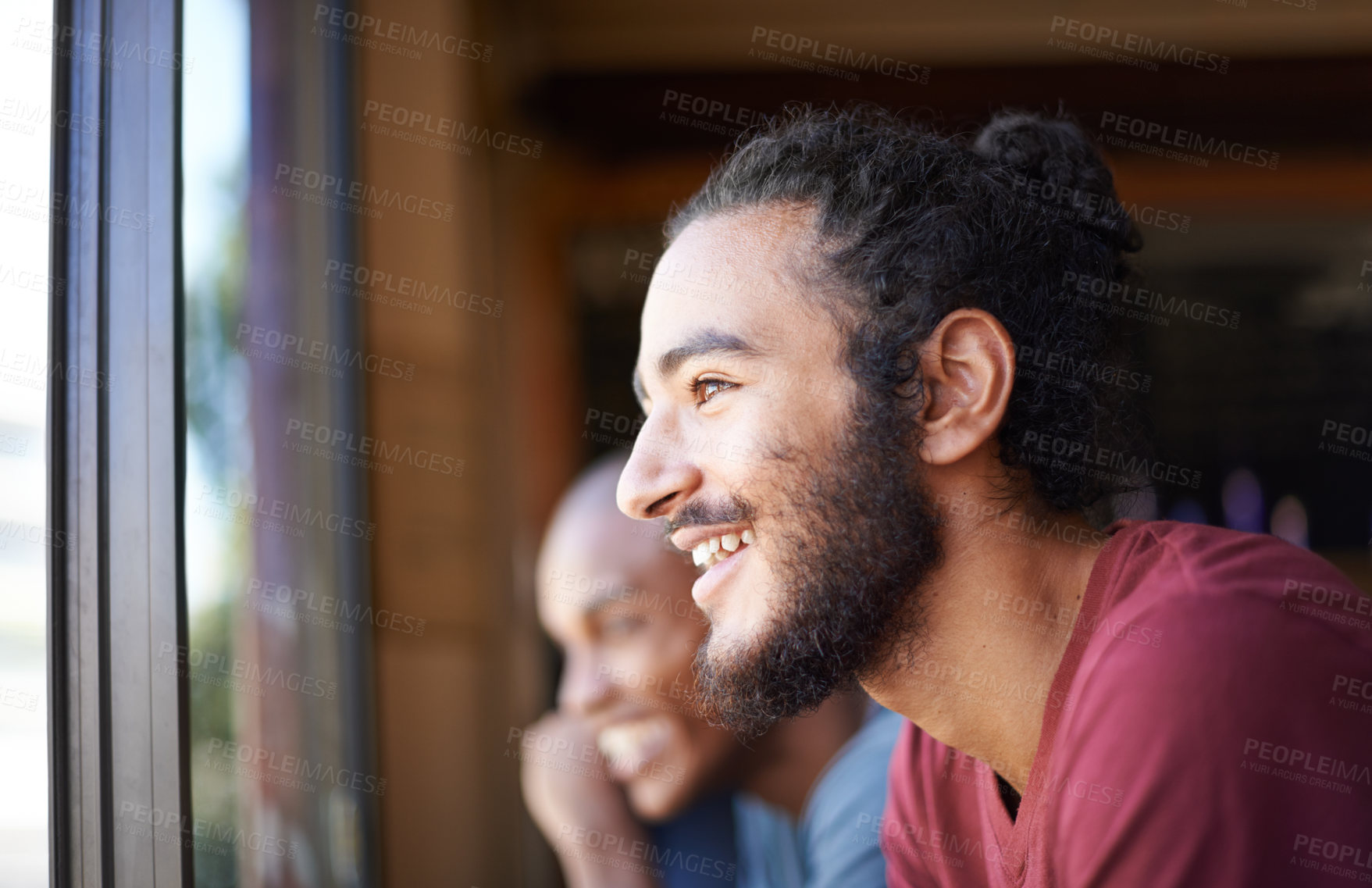 Buy stock photo Face, smile and man at window of coffee shop to relax with view or enjoy free time off closeup. Cafe, customer and retail with happy young person in restaurant for service or hospitality industry