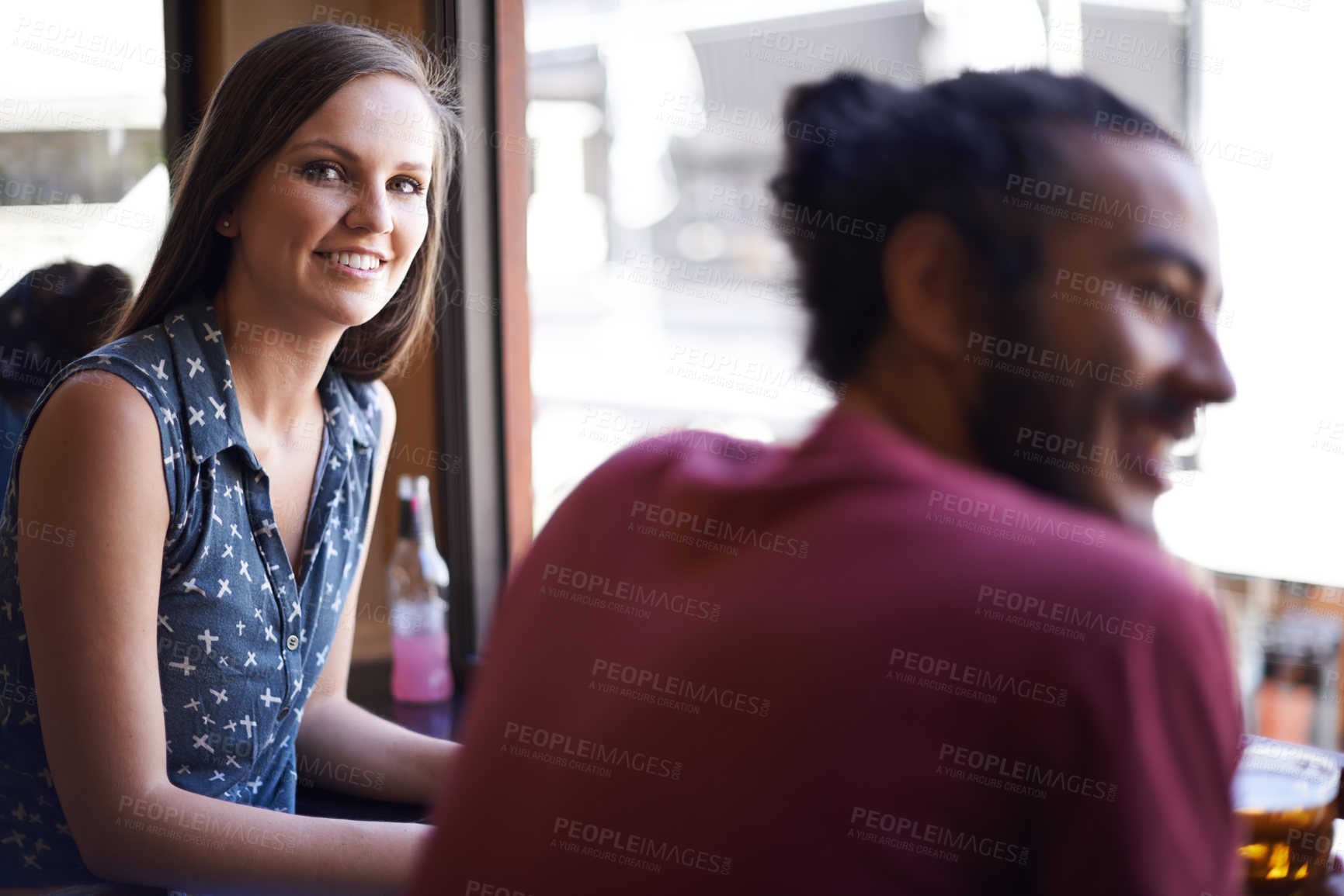 Buy stock photo Friends, man and woman in pub with beer, drink and relax in social event or party with conversation. Window view, people and alcohol in club with glass or smile, bonding and celebration in restaurant