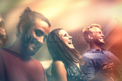 Buy stock photo Face, smile and woman with friends in club for dance to music at event, festival or neon party. Concert, energy and night with group of happy young people in crowd of venue for disco or celebration