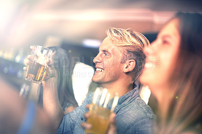 Buy stock photo Smile, man and drinking beer with friends in pub at party for celebration together in restaurant to relax for leisure in club. Happy, group or people with alcohol in glass at bar for social gathering