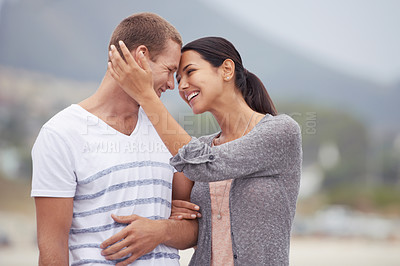Buy stock photo Happy couple, hug and walk on the beach for travel, forehead touch and together outdoor. Romantic adventure, love and affection for bonding, support and trust with commitment on holiday in Mexico