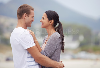 Buy stock photo Couple, hug and beach for travel, happiness together and fresh air outdoor. Romantic adventure, love and affection for bonding, support and trust with commitment and holiday in Mexico for honeymoon