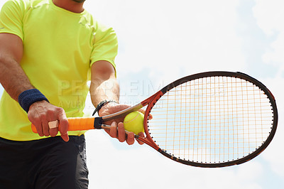 Buy stock photo Man, serve and racket with tennis ball on court, athlete and player in professional competition. Fitness, sky or sport person in training for tournament, skill or stance of playing hand for action