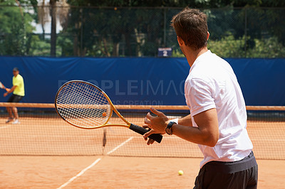 Buy stock photo People, playing and competition on tennis court, athlete and action with ball to score. Opponent, intensity and training in set in tournament, fitness and target of professional player in summer game