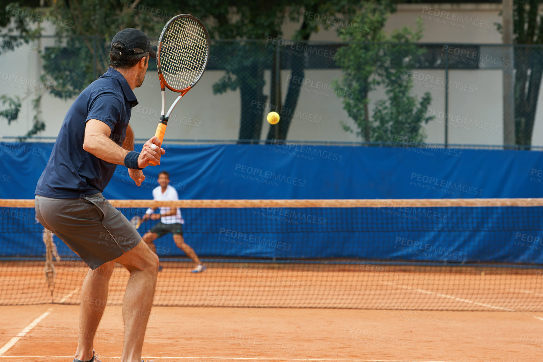 Buy stock photo Two male tennis players on the court