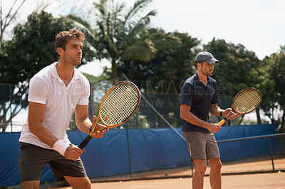 Buy stock photo Fitness, sports or tennis and doubles team with men on court for competition, game or match together. Exercise, partner and training with confident young athlete people outdoor in summer for action