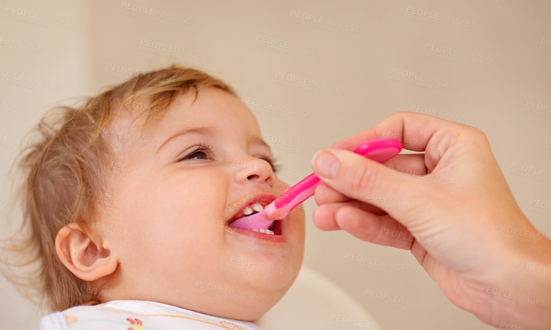 Buy stock photo Baby girl, breakfast and eating for food, nutrition and development with spoon at house, home and living room. Infant, female child and kid happy for feeding, snack and healthy diet for growth