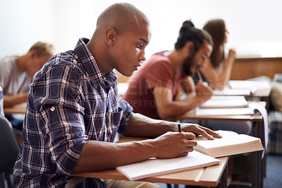 Buy stock photo Cropped shot of a young college students in class
