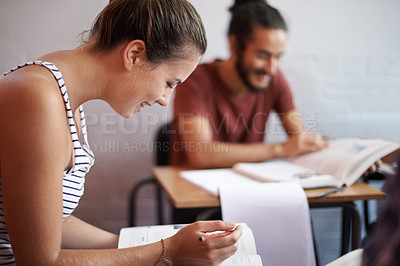 Buy stock photo Woman, exam and writing in college, learning and knowledge on campus for education. Student, female person and notes for information in book, planning and research for studying or revision in profile