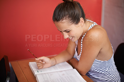 Buy stock photo College student, reading and desk in classroom with books for english literature or language for exam. Female person, university and scholarship for learning or education, knowledge and studying.